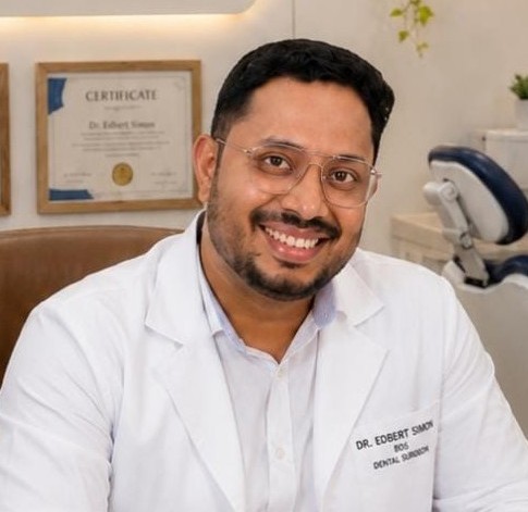Dr. Edbert Simon.K