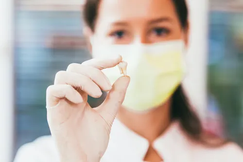 Painless tooth extraction at White Dental Care Thrissur